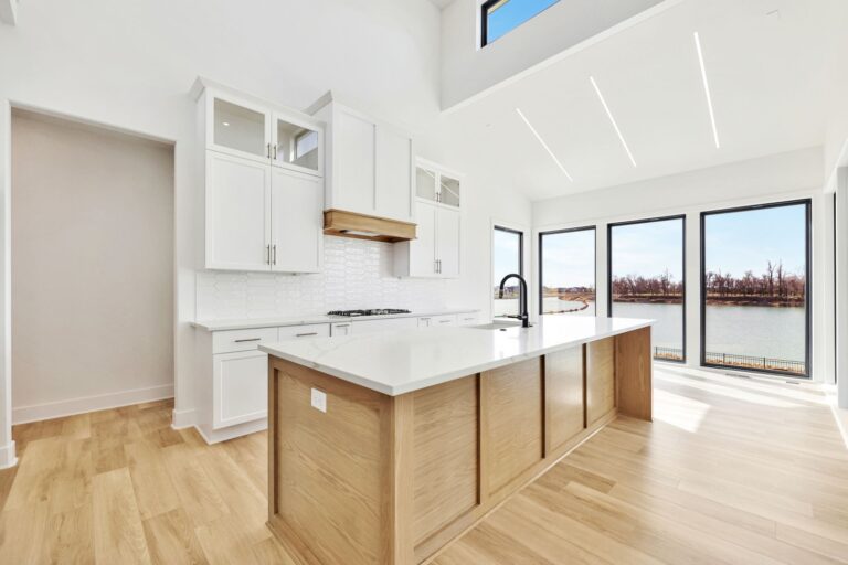A Paul Gray Homes luxury white kitchen