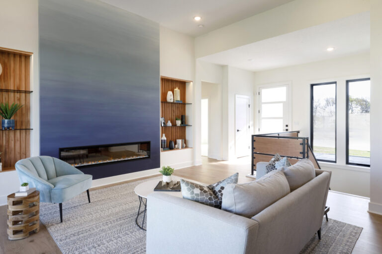 A stunning Socora living room with a custom fireplace
