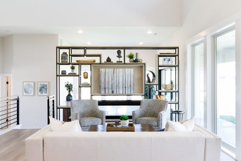 The cozy fireplace in a Valencia home plan