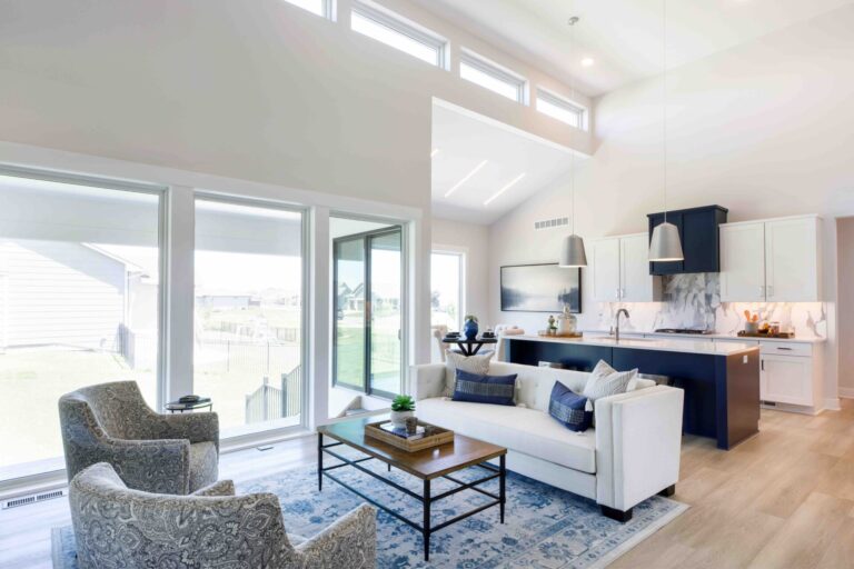 The living room and kitchen in a Valencia home plan
