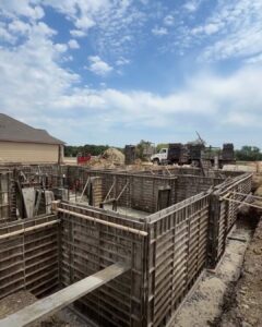 Fall foundation pour on a new home construction Wichita Ks jobsite in Wichita, Kansas